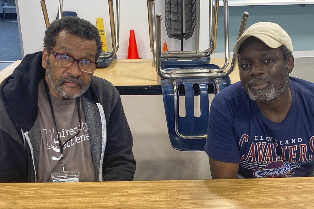 Slavic Village residents Jeffery Mills, left, and Joseph Turnage are hopeful about Slavic Village’s future with the new University Settlement headquarters as a hub